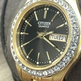 Citizen Quartz Women's Crystal Accent Gold Tone Watch Black Dial Date