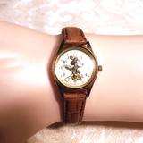 Disney Accessories | Ladies Disney Parks Minnie Mouse Watch Wtan Leather Band, New Battery | Color: Gold/Tan | Size: Os