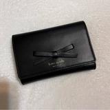 Kate Spade Bags | Kate Spade Sawyer Street Callie In Black Leather Bow Wallet | Color: Black | Size: Os