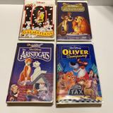 Disney Media | 4 Disney Tapes 101 Dalmatians, Lady And The Tramp, Aristocats, Oliver & Company | Color: Blue/White | Size: Os