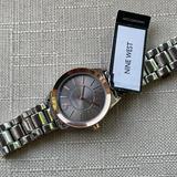 Nine West Accessories | Nine West Women Wristwatch Silver Tone Gold Tone Bezel Analog Quartz Watch New | Color: Silver | Size: Os