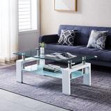 Ivy Bronx Ikeer Coffee Table, Tempered Glass Top Coffee Table, Rectangular Double-Layer Table Glass in White, Size 17.79 H x 47.29 W x 23.69 D in