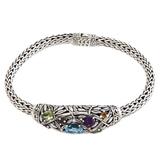 Blue topaz and peridot braided bracelet 'Bamboo Blossoms'