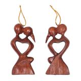 Wood ornaments, 'Kissing Heart' (pair)