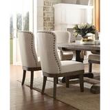 Laurel Foundry Modern Farmhouse® Emelina Dining Chair in Beige Linen/Upholstered/Fabric in Brown | Wayfair 2D25C0C05C814BB98BF4B917C483A91C
