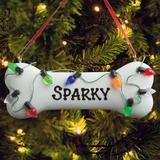 The Holiday Aisle® Lighted Dog Bone Personalized Hanging Figurine Ornament Plastic in White, Size 1.5 H x 4.0 W x 0.25 D in | Wayfair