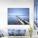 East Urban Home Seascape 'Dark Sky & Large Pier' Photograph Canvas in Blue | 12 H x 20 W x 1 D in | Wayfair ERNH5188 46703835