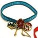 Disney Jewelry | 10pc Lot: Disney Couture Pocahontas Turquoise Bracelets With 14kt Gp Charms**New | Color: Blue/Gold/Red | Size: 10pc