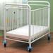 Harriet Bee Deckard Mini Portable Upholstered Crib w/ Mattress Metal in White | 40 H x 27 W in | Wayfair CS-8510W