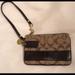 Coach Bags | Coach Classic Signature Print Wristlet | Color: Brown | Size: Os