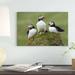 East Urban Home 'Atlantic Puffin Group, Faroe Islands' Photographic Print on Wrapped Canvas Canvas | 12 H x 18 W x 1.5 D in | Wayfair