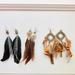 Urban Outfitters Jewelry | 3 Pairs Of Feather Earrings. | Color: Gold/Orange | Size: Os