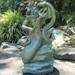 HomeStyles Life's a Beach Poseidon Ruler of the Sea Mermaid on Nautical Rock Statue Concrete/Stone in Gray/Green | 21 H x 10 W x 9.25 D in | Wayfair