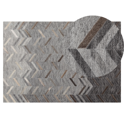 Teppich Grau 140 x 200 cm aus Leder Kurzflor Zackenmuster Handgefertigt Rechteckig Modern