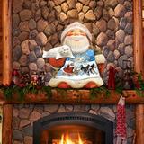 The Holiday Aisle® Tidaholm Northern Light Santa Wooden Door Hanger Wood in Brown | 24 H x 18 W x 0.5 D in | Wayfair
