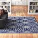 Blue/Navy 63 x 0.5 in Area Rug - Charlton Home® Chua Floral Navy Blue/Ivory Area Rug Polypropylene | 63 W x 0.5 D in | Wayfair