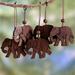 The Holiday Aisle® Elephant Holiday Wood Hanging Figurine Ornament Set of 5 Wood in Brown | 2 H x 2.6 W x 0.2 D in | Wayfair 203271