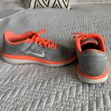 Nike Shoes | *Price Drop* Nike Women’s Running Shoes | Color: Gray/Orange | Size: 7