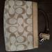 Coach Bags | Gently Used Once Gold Coach Wristlet | Color: Cream/Gold | Size: Os