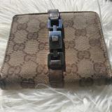 Gucci Bags | Gucci Tan Monogram Canvas Wallet | Color: Brown/Tan | Size: Os