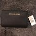 Michael Kors Bags | Michael Kors Jet Set Travel Wallet Brand New | Color: Black/Gold | Size: Os