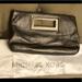 Michael Kors Bags | Michael Kors Silver Metallic Clutch | Color: Gray/Silver | Size: Os