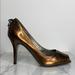 Jessica Simpson Shoes | Jessica Simpson Peep Toe Pumps 7 Bronze Copper | Color: Brown/Gold | Size: 7