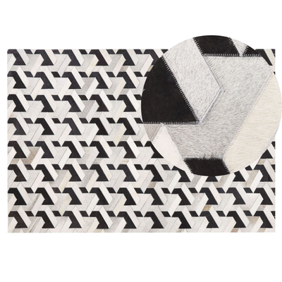 Teppich Schwarz/Grau Kuhfell rechteckig 140x200 cm Patchwork 3D Muster Lederteppich für Wohnzimmer Schlafzimmer Flur Sal