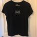 Michael Kors Tops | Michael Kors Black T-Shirt With Mk In Crystals. | Color: Black | Size: L