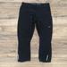 Nike Pants & Jumpsuits | Nike Women’s Black Workout Capri Pants L | Color: Black | Size: L