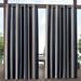 Exclusive Home Canopy Stripe Indoor/Outdoor Grommet Top Curtain Panel Pair 54 x96 Navy / Sand