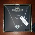 Coach Jewelry | Coach Necklas | Color: Gray/Silver | Size: Os