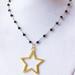Urban Outfitters Jewelry | Gold Star Pendant Necklace | Color: Black/Gold | Size: Os