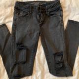 American Eagle Outfitters Jeans | Distressed Black Denim Skinny Jeans American Eagle | Color: Black | Size: 2