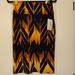 Lularoe Skirts | Lularoe Cassie Nwt | Color: Black/Gold | Size: S