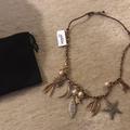 J. Crew Jewelry | J.Crew Firework Charm Necklace Gold Multi B4971 | Color: Brown/Gold | Size: Os