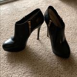 Michael Kors Shoes | Michael Kors High Heel Black Bootie | Color: Black/Gold | Size: 7.5