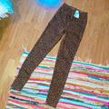 American Eagle Outfitters Jeans | Nwt American Eagle Cheetah Print Jegging | Color: Black/Brown | Size: 0 Long