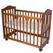 Harriet Bee Deen 2-in-1 Convertible Cradle & Mini Crib w/ Mattress Wood in Brown | 26 H x 19.5 W in | Wayfair 35 Pecan