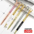 Stylo à bille diamant en poudre d'or créative stylo en métal huilé stylo cadeau publicitaire Logo