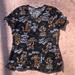 Disney Tops | Disney “Tigger “ Scrub Top. Size Small. Euc | Color: Black/Orange | Size: S