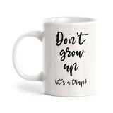 Trinx Don't Grow up It's a Trap Coffee Mug Ceramic in Black/Brown/White | 4 H in | Wayfair 89098092E5B04D5D915B34751C47F25C