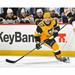 Bryan Rust Pittsburgh Penguins Unsigned Gold Alternate Jersey Skating vs. Boston Bruins Photograph
