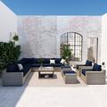 Wade Logan® Ailie 12 Piece Rattan Sectional Seating Group w/ Cushions Synthetic Wicker/All - Weather Wicker/Wicker/Rattan in Blue | Outdoor Furniture | Wayfair