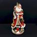 The Holiday Aisle® Traditional Musical Santa Figurine Resin | 11 H x 5 W x 4 D in | Wayfair E18AEE2C560A41FC8E157EB4F7BD0461
