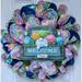 The Holiday Aisle® Easter Welcome Wreath w/ Truck & Colored Eggs Burlap/Deco Mesh in Blue/Green/Indigo | 24 H x 24 W x 6 D in | Wayfair