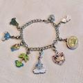 Disney Accessories | Disney Charm Bracelet With 9 Charms | Color: Silver | Size: Osg