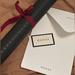 Gucci Bags | Gucci Black Gg Embossed Gift Wrap Envelope, Paper And Sticker!! | Color: Black | Size: Os