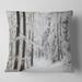 Designart 'Dense Winter Forest and Lane' Forest Throw Pillow
