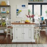 Homestyles Americana Distressed Off-White Oak Kitchen Island Set with Two Counter Stools